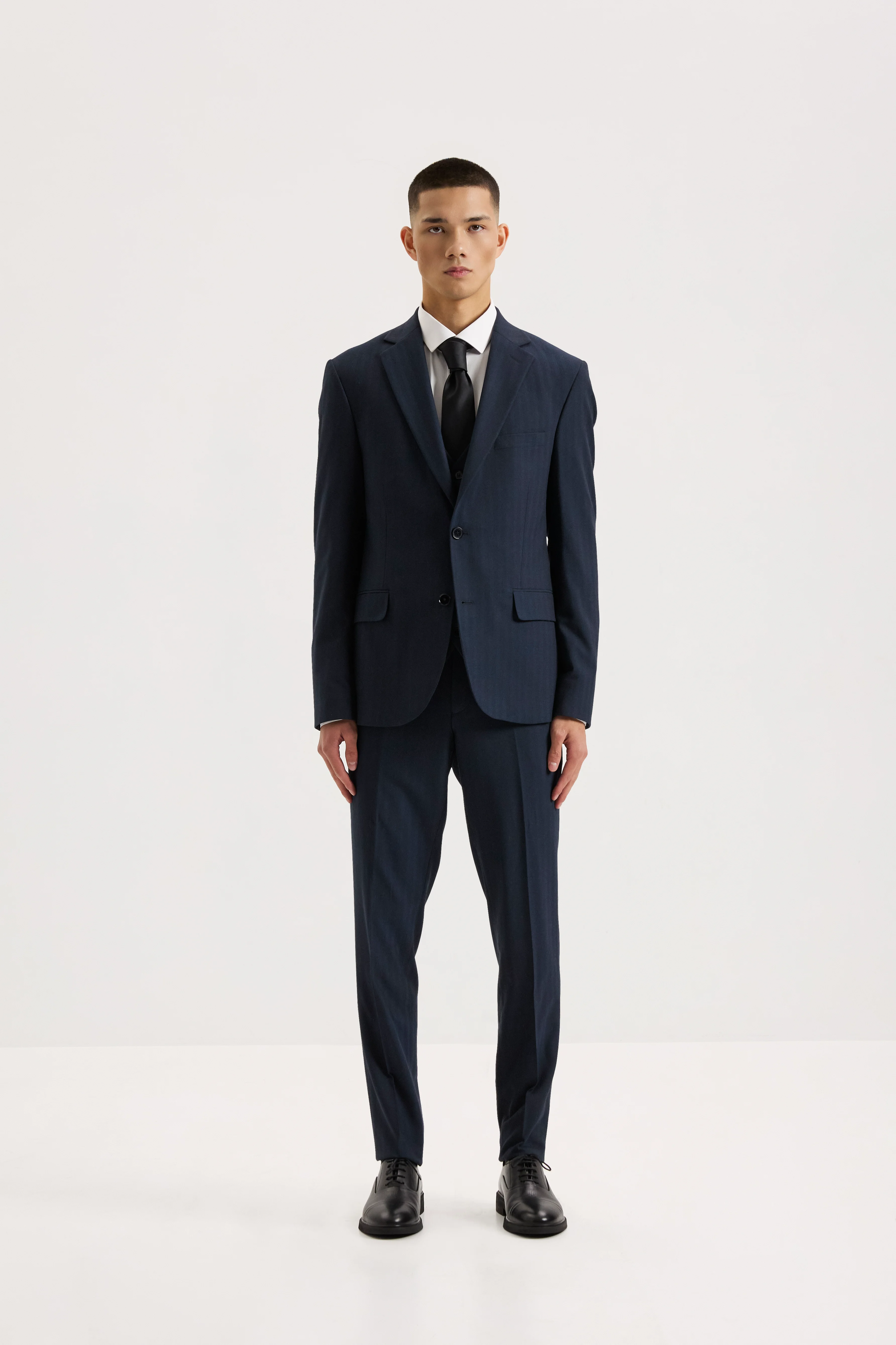 Чоловічий костюм-трійка з вовною синій з вкрапленнями